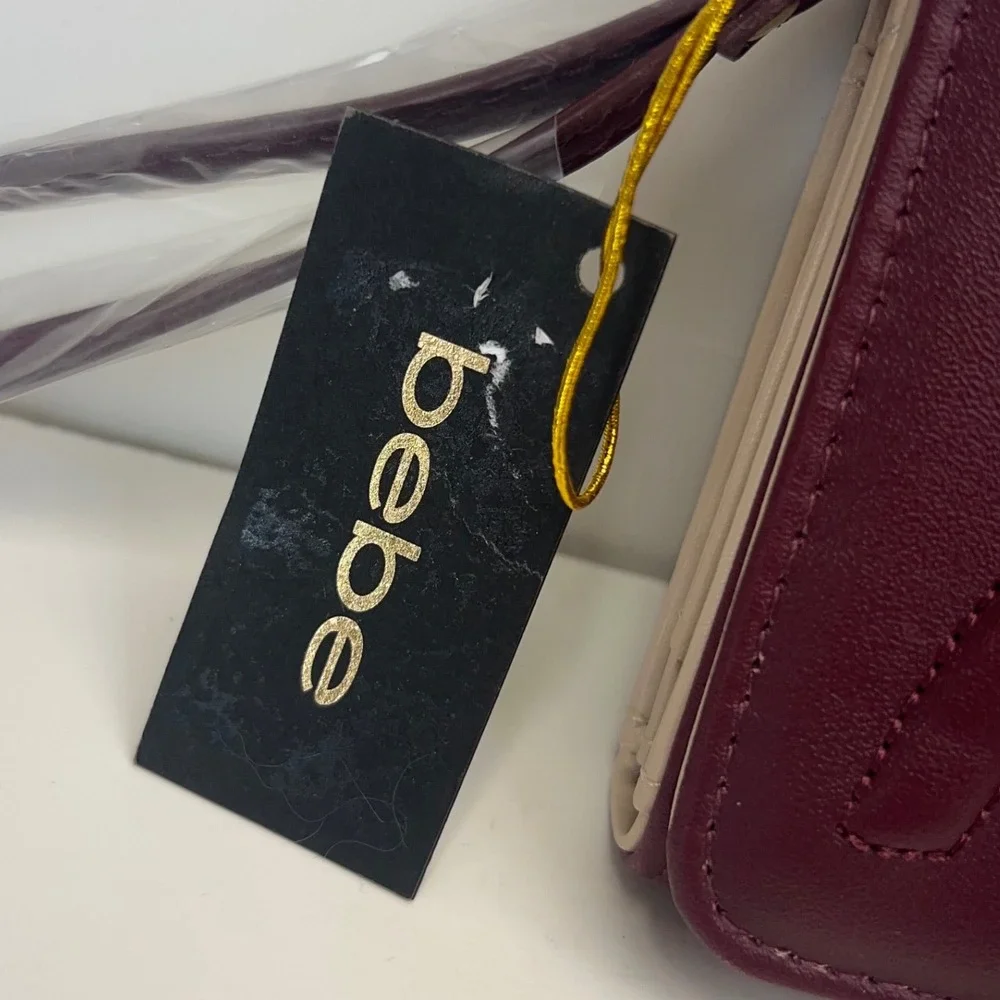 BEBE Louisa Trifold Wallet Multi Slots Embossed Logo Wristlet Clutch Purple NEW